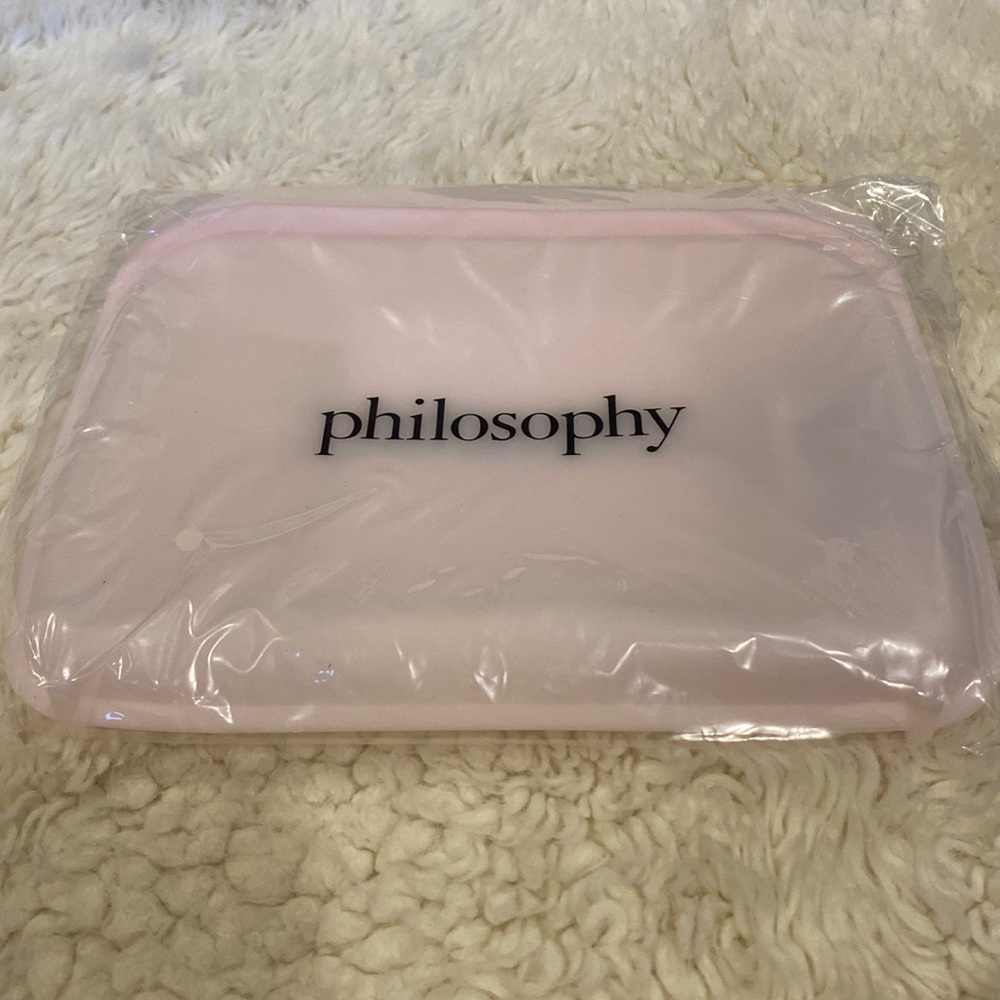 Brand new Philosophy pink silicone pouch for travel